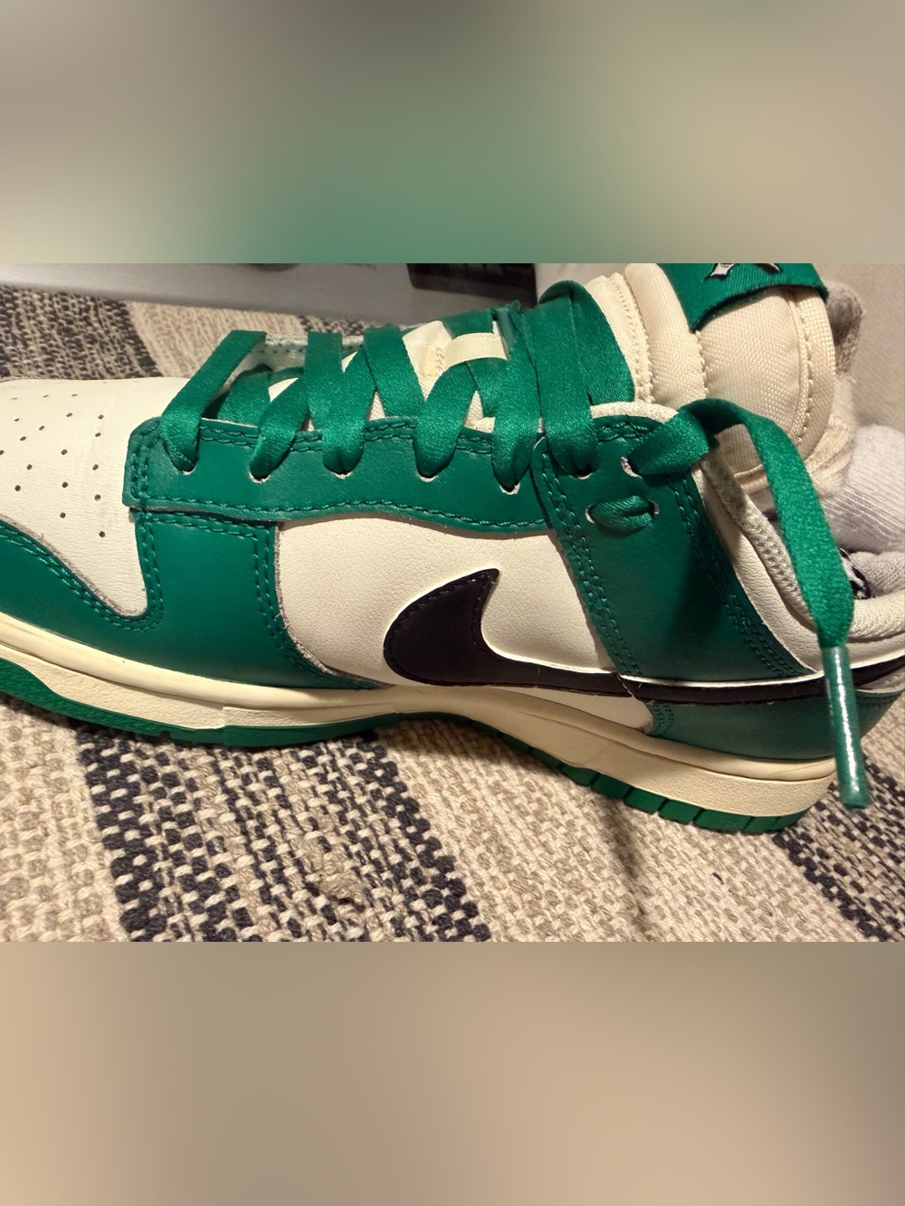 Nike white Low-Top Sneaker with Green Accent and Black Swoosh